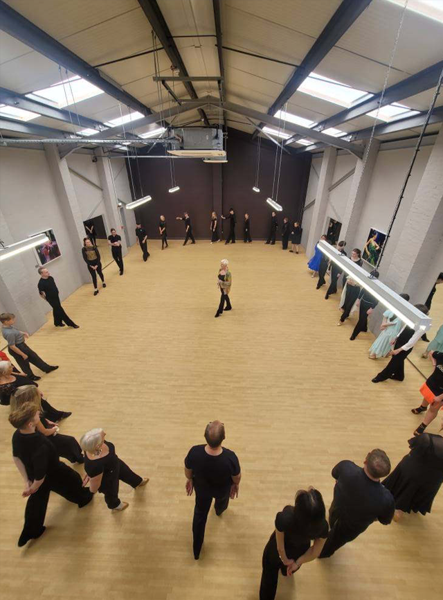 Pure Dance Studio with people. 