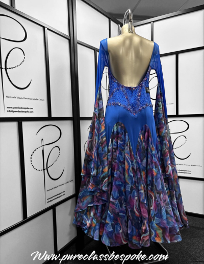 Back of blue and patterned blue and patterned couture gown.